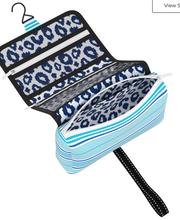 Load image into Gallery viewer, Scout Beauty Burrito toiletry bag that hangs up and folds and rolls up when not in use in Seas The Day
